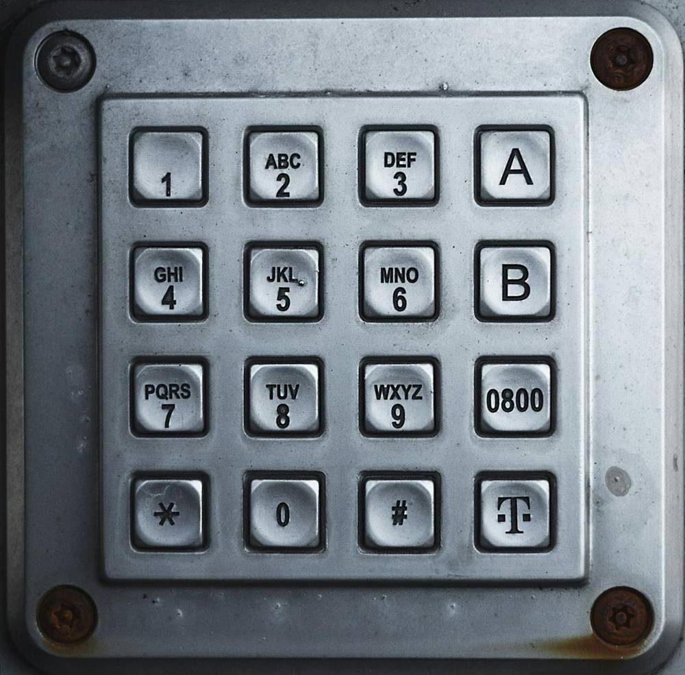 Close-up of a metal push-button keypad