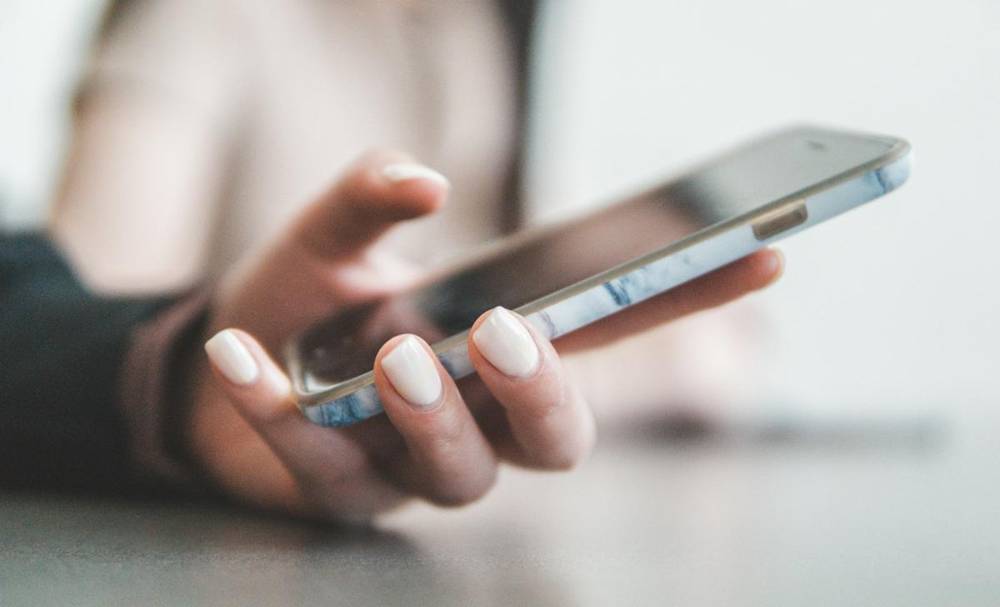 Hand holding a smartphone
